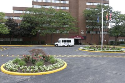 Our shuttle and the exterior of our hotel